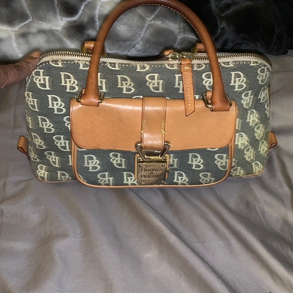 Dooney & Bourke Handbags - EUC Dooney & Bourke Small Domed w/ front pocket w/ snap lock